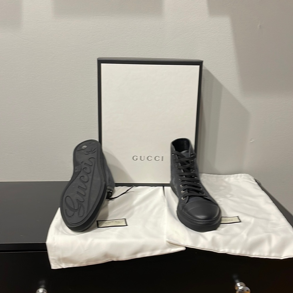 Mens black Gucci sneakers worn once. Still in original bags and box.